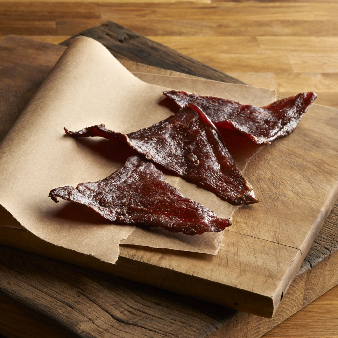 beef jerky cuts on parchment paper